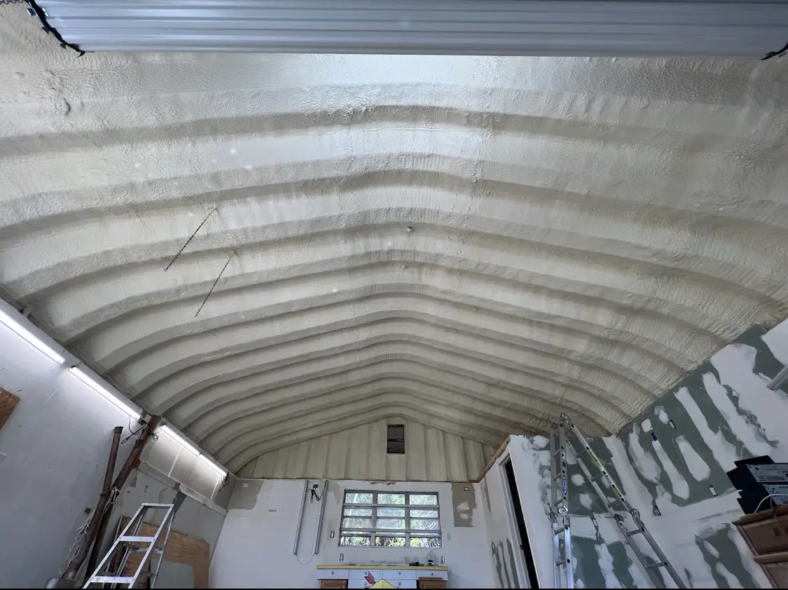 Spray polyurethane foam applied to the underside of a metal roof deck in Platteville